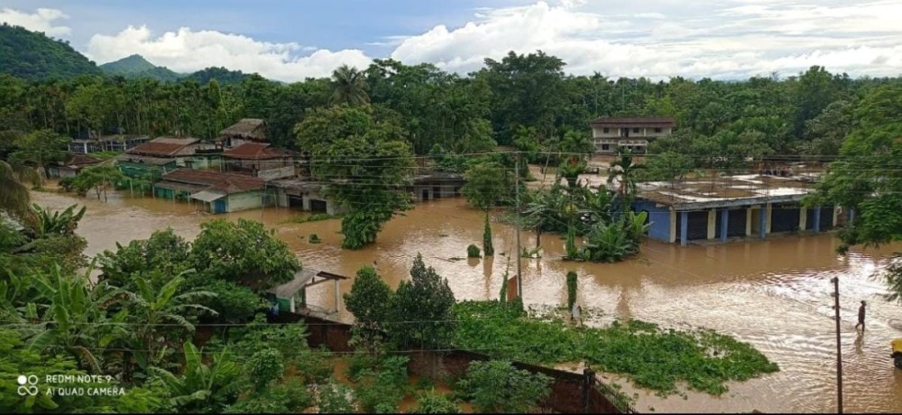 Incessant monsoon rains and flash floods have submerged several houses in Mon district. Nearly 950 homes across the area have been either partially or fully damaged, displacing numerous families. (Photo Courtesy: Konyak Union)